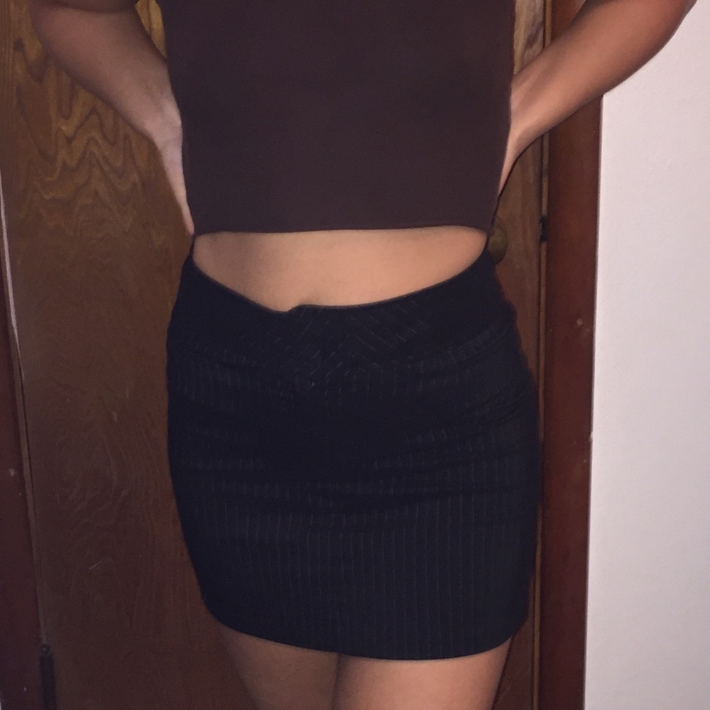 Black mini skirt striped with metallic silver